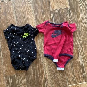 2 Nike onsies